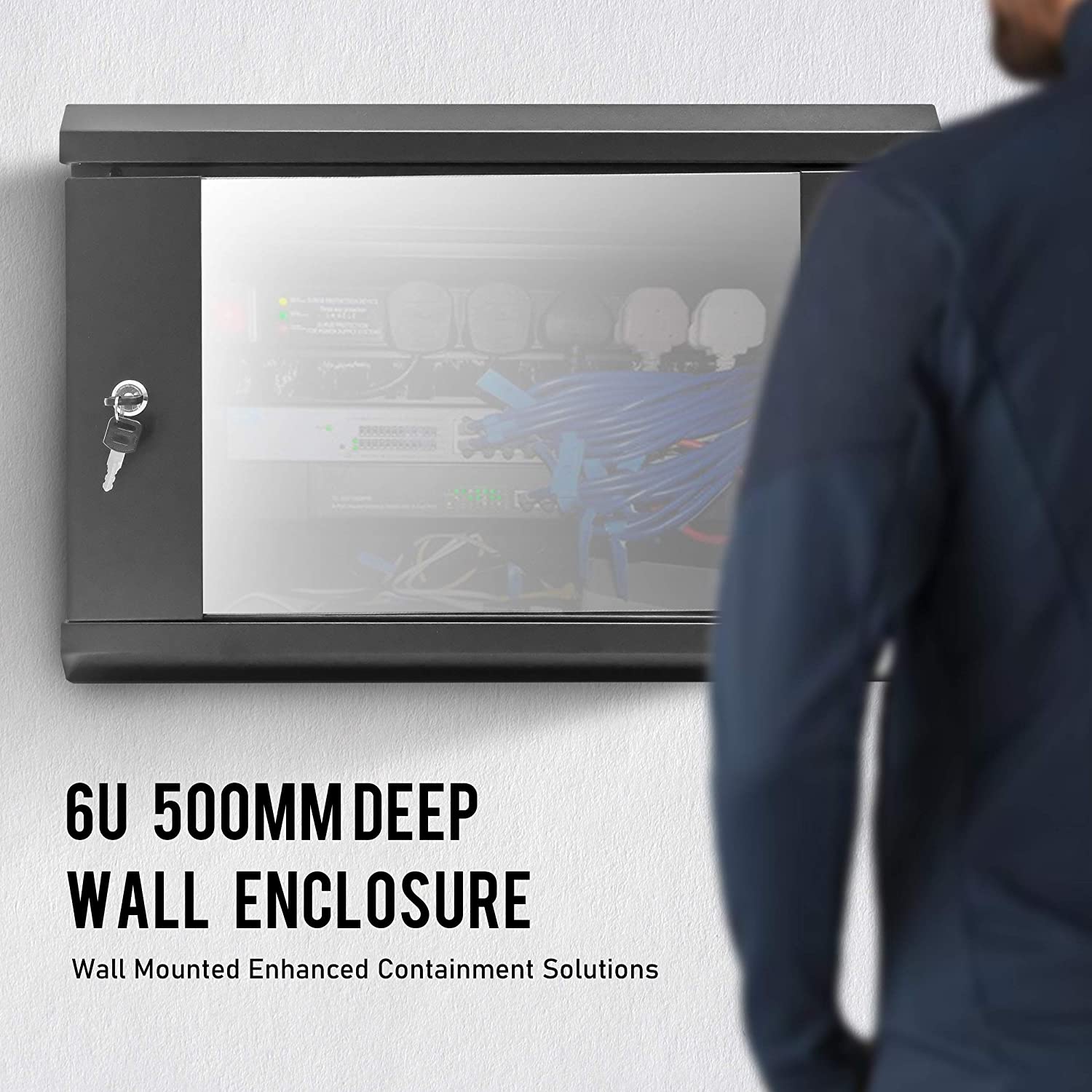 Front view of a closed 6U Wall Mount Data Cabinet with a man standing in front.