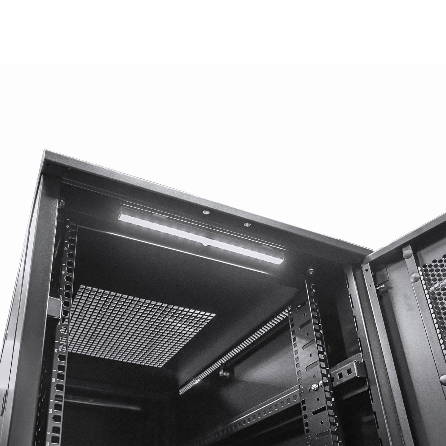 A 15U Server  Cabinet interior  showing its rack mounts and installed lighting.