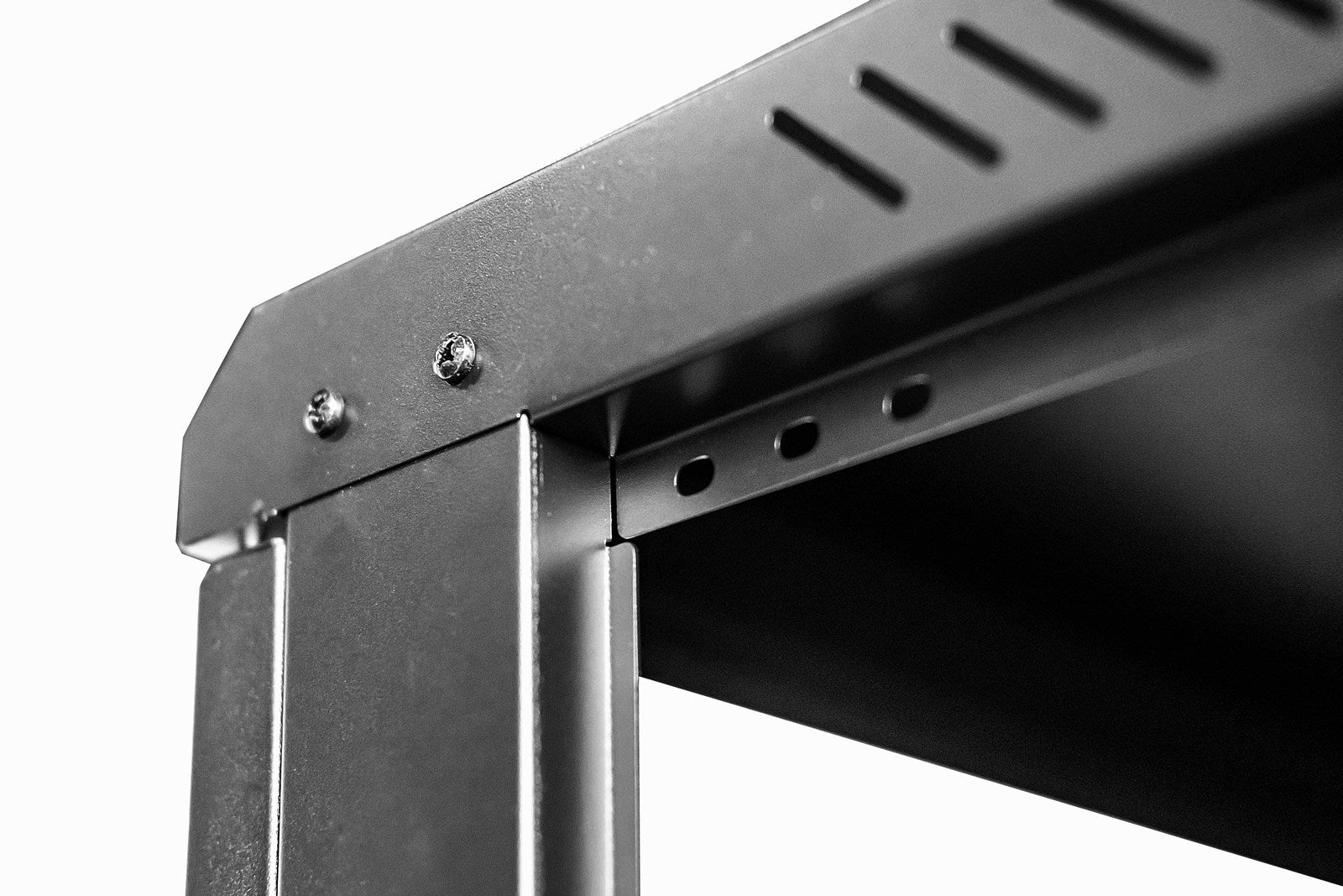 Structure pillars of a flat-packed 9U 450mm Deep Wall Mount Data Cabinet.